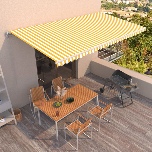 Manuaalisesti sisäänkelattava markiisi 600x350 cm keltavalkoinen - Sisustajankoti.fi